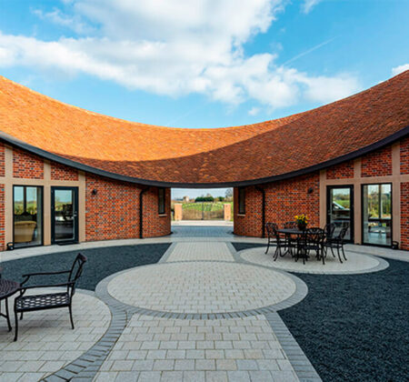 Ten Oaks, Bovingdon New build with wood-fired plain clay tiles and natural slating for the roof.