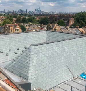 Elm Court School, Brixton. Pitched roofing refurbishment – natural slating.