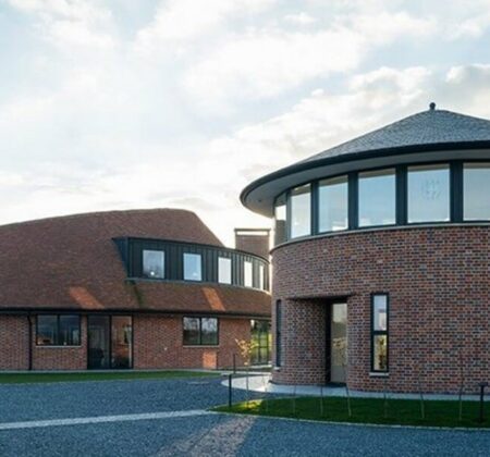 Ten Oaks, Bovingdon New build with wood-fired plain clay tiles and natural slating for the roof.