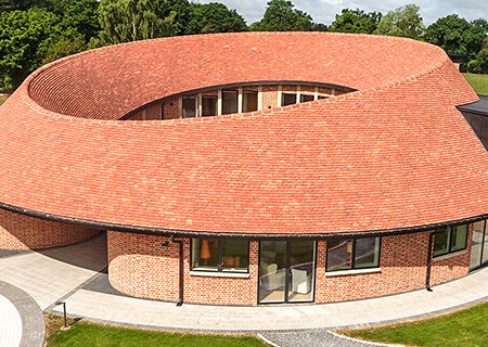 Ten Oaks, Bovingdon New build with wood-fired plain clay tiles and natural slating for the roof.