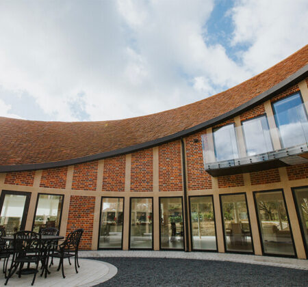 Ten Oaks, Bovingdon New build with wood-fired plain clay tiles and natural slating for the roof.