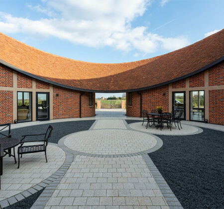 Ten Oaks, Bovingdon New build with wood-fired plain clay tiles and natural slating for the roof.